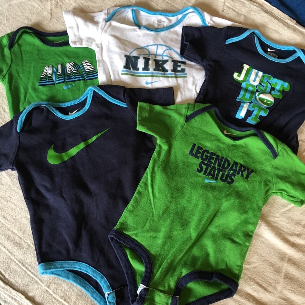 5 Nike onesies